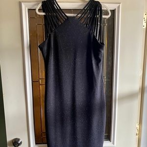 Super sparkly and strappy black mini dress!